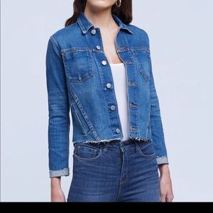 Dark blue denim jacket with saw hem.